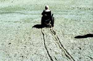 Wheelchair on the Beach, by Kris Krug (CC)